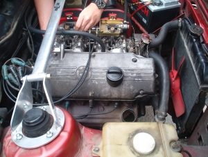 European auto specialist repairing BMW engine